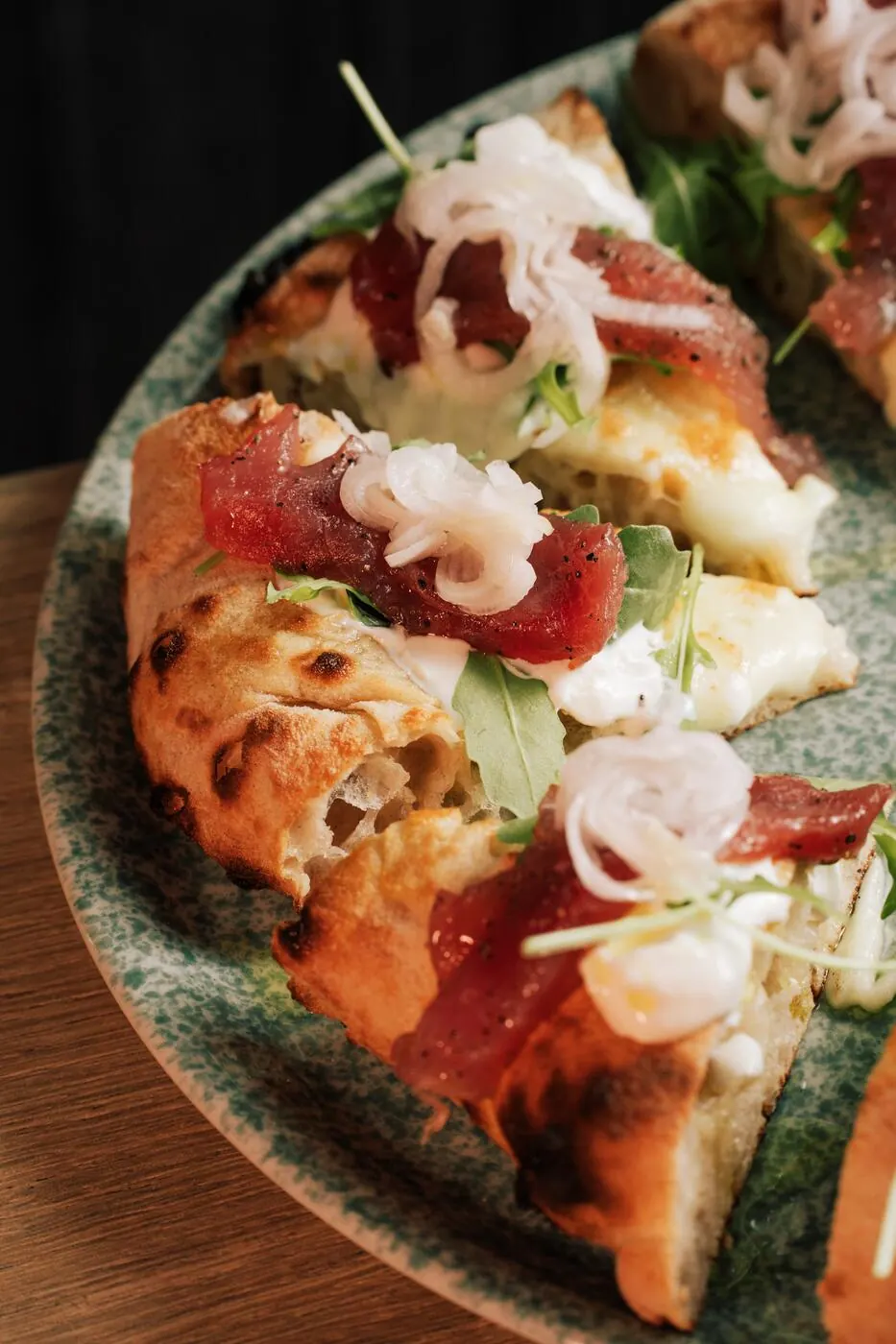 Gourmet pizza with Parma ham and stracciatella